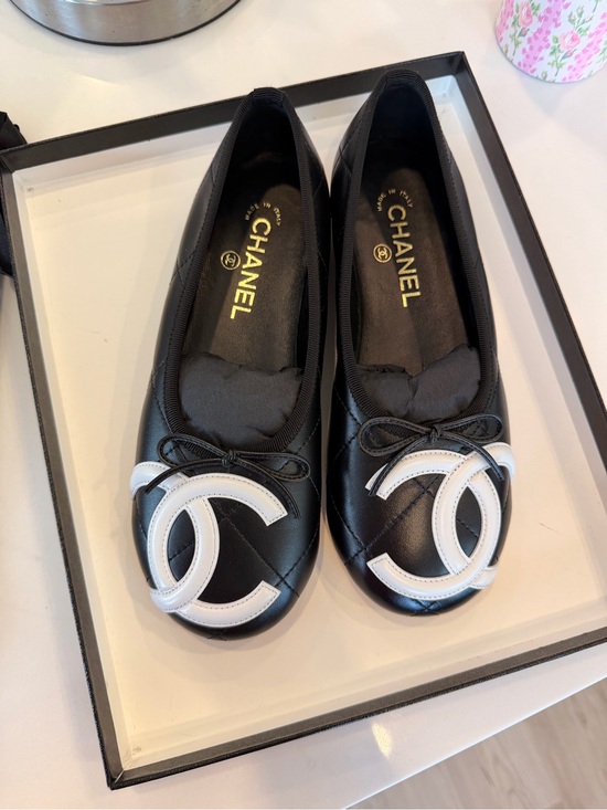 CHANEL Shoes - CHANEL Black Leather Ballet Flats with White CC Appliqué